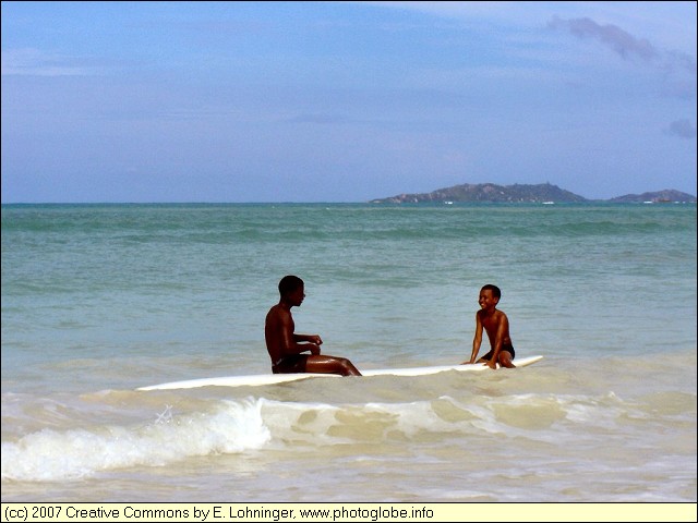 Two Kids on a Surf Board